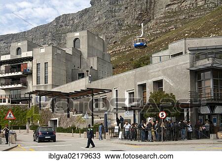 Tourists standing at the valley station of the Table Mountain cable car ticket office, Cape Town, South Africa, Africa View Large Photo Image Stock Image - Tourists standing at the valley station of the Table Mountain cable car ticket office, Cape Town, South Africa, Africa. Fotosearch