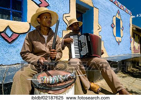 Stock Photography - Traditional musicians playing an accordion and a drum, Basotho Cultural Village, Golden Gate National Park, Free State, South Africa, Africa. Fotosearch