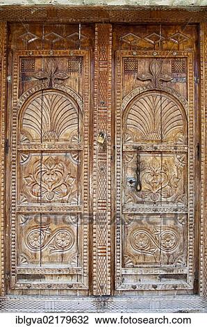 Traditional wooden door with ornate carvings, Ash Shab, Sultanate of Oman, Middle East, Southwest Asia, Asia View Large Photo Image Stock Image - Traditional wooden door with ornate carvings, Ash Shab, Sultanate of Oman, Middle East, Southwest Asia, Asia. Fotosearch