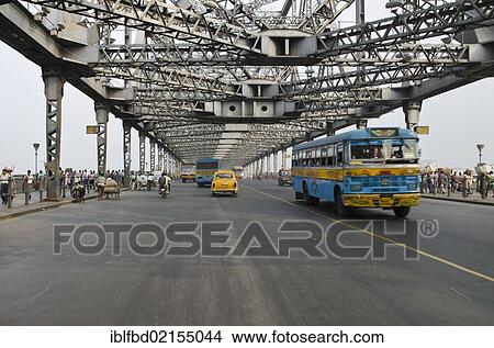 Traffic on the 705 m long Howrah Bridge, 1943, connecting Kolkata and Howrah, Kolkata, West Bengal, India, Asia View Large Photo Image Picture - Traffic on the 705 m long Howrah Bridge, 1943, connecting Kolkata and Howrah, Kolkata, West Bengal, India, Asia. Fotosearch