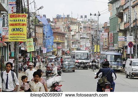 Traffic, pedestrians and vehicles on the main street in Kathmandu, Nepal, Asia View Large Photo Image Stock Photo - Traffic, pedestrians and vehicles on the main street in Kathmandu, Nepal, Asia. Fotosearch