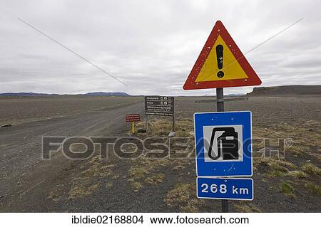 Traffic sign and warning sign on a high-altitude road "next petrol station in 268km", Iceland, Northern Europe, Europe View Large Photo Image Picture - Traffic sign and warning sign on a high-altitude road "next petrol station in 268km", Iceland, Northern Europe, Europe. Fotosearch