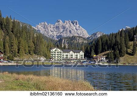 Stock Image - Tre Cime di Lavaredo or Drei Zinnen peaks, Istituto Pio XII, Lake Misurina, Dolomites, Italy, Europe. Fotosearch