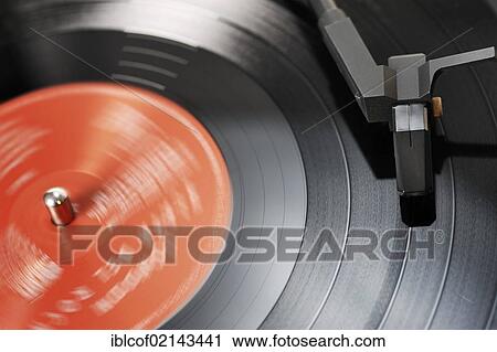 Turntable playing an LP record View Large Photo Image Stock Image - Turntable playing an LP record. Fotosearch