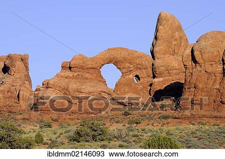 Turret Arch, rock bridge or natural arch in Arches National Park, Utah, USA, North America View Large Photo Image Stock Image - Turret Arch, rock bridge or natural arch in Arches National Park, Utah, USA, North America. Fotosearch