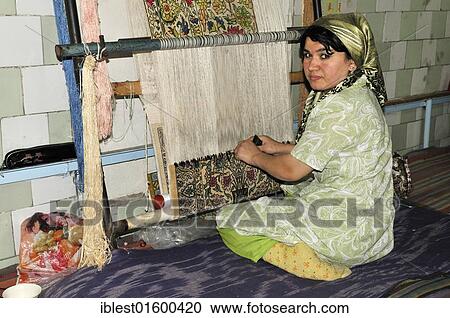 Usbek woman weaving a silk rug, Silk Road, Fergana Valley, Uzbekistan, Central Asia, Asia View Large Photo Image Stock Image - Usbek woman weaving a silk rug, Silk Road, Fergana Valley, Uzbekistan, Central Asia, Asia. Fotosearch
