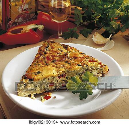 Vegetable tortilla, potato omelette with courgettes and red peppers, Spain, Europe View Large Photo Image Picture - Vegetable tortilla, potato omelette with courgettes and red peppers, Spain, Europe. Fotosearch