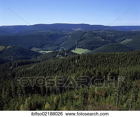 Stock Photograph - View across the Thuringian Forest, Thueringer Wald, from the lookout tower on Mt Kickelhahn towards Mt Schneekopf near Ilmenau, Thuringia, Germany, Europe. Fotosearch