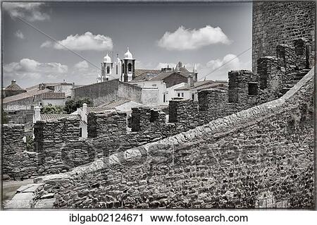 Stock Image - View from the ramparts to the Santa Maria da Lagoa Church or Nossa Senhora de Lagoa, Monsaraz, Alentejo, Portugal, Europe. Fotosearch