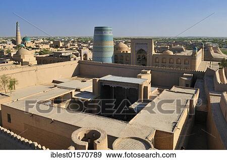 Stock Photo - View over Ichan Kala the historic adobe town of Khiva, Chiva, Silk Road, Unesco World Heritage Site, Uzbekistan, Central Asia, Asia. Fotosearch