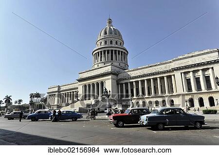 Vintage car from the 50s in front of the Capitolio Nacional, a building in the style of Neoclassicism, Prado, Paseo de Marti, a boulevard in the centre of Havana, Centro Habana, Cuba, Greater Antilles, Caribbean, Central America, America, North America View Large Photo Image Picture - Vintage car from the 50s in front of the Capitolio Nacional, a building in the style of Neoclassicism, Prado, Paseo de Marti, a boulevard in the centre of Havana, Centro Habana, Cuba, Greater Antilles, Caribbean, Central America, America, North America. Fotosearch