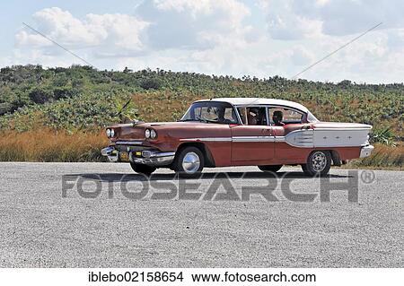 Picture - Vintage or classic car from the 1950's, Trinidad, Cuba, Greater Antilles, Caribbean, Central America, America, North America. Fotosearch