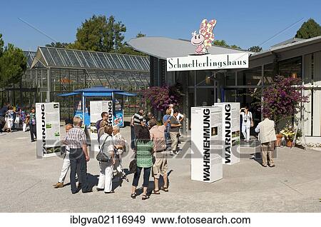 Visitors at the entrance to the butterfly house on Mainau island, Lake Constance, Baden-Wuerttemberg, Germany, Europe View Large Photo Image Stock Photo - Visitors at the entrance to the butterfly house on Mainau island, Lake Constance, Baden-Wuerttemberg, Germany, Europe. Fotosearch