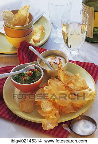 Warm chips with passion fruit and avocado dip, hot starter, Australia, Oceania View Large Photo Image Picture - Warm chips with passion fruit and avocado dip, hot starter, Australia, Oceania. Fotosearch