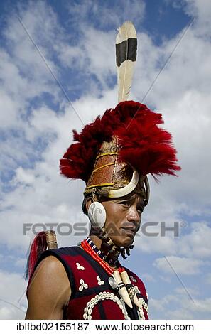 Stock Photo - Warrior of the Yimchunger tribe waiting to perform ritual dances at the Hornbill Festival, Kohima, Nagaland, India, Asia. Fotosearch