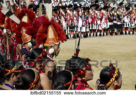 Warriors of different tribes waiting to perform ritual dances at the Hornbill Festival, Kohima, Nagaland, India, Asia View Large Photo Image Stock Photography - Warriors of different tribes waiting to perform ritual dances at the Hornbill Festival, Kohima, Nagaland, India, Asia. Fotosearch