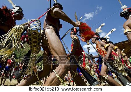 Warriors of the Konyak tribe performing ritual dances at the Hornbill Festival, Kohima, Nagaland, India, Asia View Large Photo Image Stock Image - Warriors of the Konyak tribe performing ritual dances at the Hornbill Festival, Kohima, Nagaland, India, Asia. Fotosearch
