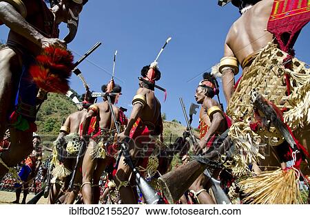 Warriors of the Konyak tribe performing ritual dances at the Hornbill Festival, Kohima, Nagaland, India, Asia View Large Photo Image Stock Photo - Warriors of the Konyak tribe performing ritual dances at the Hornbill Festival, Kohima, Nagaland, India, Asia. Fotosearch