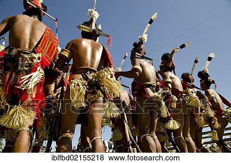 Warriors of the Konyak tribe performing ritual dances at the Hornbill Festival, Kohima, Nagaland, India, Asia View Large Photo Image Stock Photo - Warriors of the Konyak tribe performing ritual dances at the Hornbill Festival, Kohima, Nagaland, India, Asia. Fotosearch