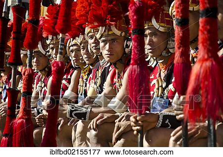Warriors of the Yimchunger tribe waiting to perform ritual dances at the Hornbill Festival, Kohima, Nagaland, India, Asia View Large Photo Image Stock Photo - Warriors of the Yimchunger tribe waiting to perform ritual dances at the Hornbill Festival, Kohima, Nagaland, India, Asia. Fotosearch