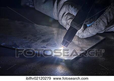 Welding torch with flame, detail view View Large Photo Image Stock Photo - Welding torch with flame, detail view. Fotosearch