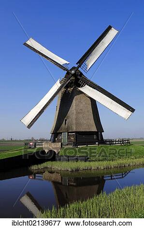 Windmill, Schermerhorn, Schermer, North Holland, Holland, Netherlands, Europe View Large Photo Image Stock Photo - Windmill, Schermerhorn, Schermer, North Holland, Holland, Netherlands, Europe. Fotosearch