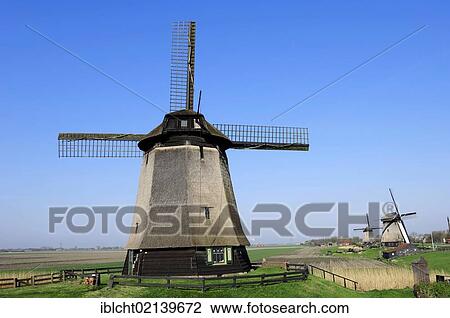 Stock Image - Windmills, Schermerhorn, Schermer, North Holland, Holland, Netherlands, Europe. Fotosearch