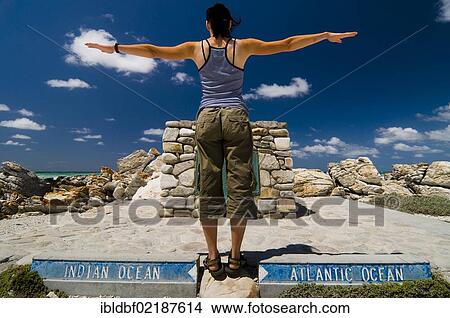 Woman at Cape Agulhas, the southernmost point of Africa, Western Cape, South Africa, Africa View Large Photo Image Picture - Woman at Cape Agulhas, the southernmost point of Africa, Western Cape, South Africa, Africa. Fotosearch