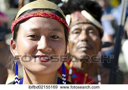Woman of the Phom tribe waiting to perform ritual dances at the Hornbill Festival, Kohima, Nagaland, India, Asia View Large Photo Image Stock Photo - Woman of the Phom tribe waiting to perform ritual dances at the Hornbill Festival, Kohima, Nagaland, India, Asia. Fotosearch