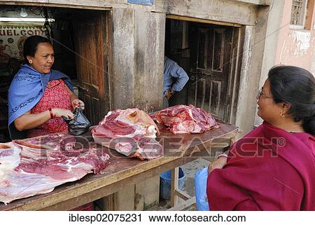Woman selling meat, Kathmandu, Nepal, Asia View Large Photo Image Stock Image - Woman selling meat, Kathmandu, Nepal, Asia. Fotosearch