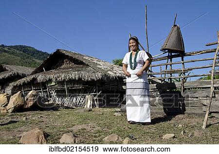 Woman wearing the typical dress of the Adi Gallo tribe, Bame village, Arunachal Pradesh, India, Asia View Large Photo Image Stock Photo - Woman wearing the typical dress of the Adi Gallo tribe, Bame village, Arunachal Pradesh, India, Asia. Fotosearch