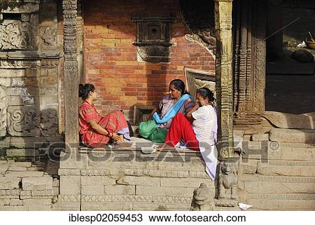 Women sitting, Taumadhi square, Bhaktapur, Kathmandu Valley, Nepal, Asia View Large Photo Image Stock Image - Women sitting, Taumadhi square, Bhaktapur, Kathmandu Valley, Nepal, Asia. Fotosearch