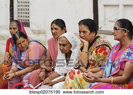 Stock Image - Women wearing traditional dress, Durbar Square, Kathmandu, Nepal, Asia. Fotosearch