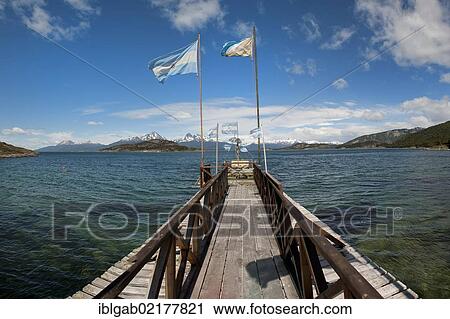 Stock Image - Wooden pier, Tierra del Fuego National Park, Bahia Ensenada, Fireland, Patagonia, Argentina, South America. Fotosearch