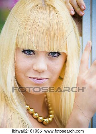 Young blond woman, portrait View Large Photo Image Stock Photography - Young blond woman, portrait. Fotosearch