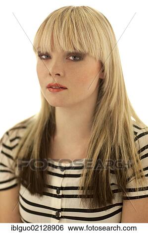 Young blond woman wearing a striped top, portrait View Large Photo Image Stock Photograph - Young blond woman wearing a striped top, portrait. Fotosearch