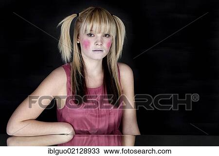 Young blond woman with red painted cheeks View Large Photo Image Stock Image - Young blond woman with red painted cheeks. Fotosearch