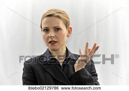 Young businesswoman, manager, in a conversation View Large Photo Image Stock Photograph - Young businesswoman, manager, in a conversation. Fotosearch