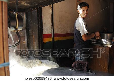 Young man, cookshop, Bhaktapur, Kathmandu Valley, Nepal, Asia View Large Photo Image Stock Photograph - Young man, cookshop, Bhaktapur, Kathmandu Valley, Nepal, Asia. Fotosearch