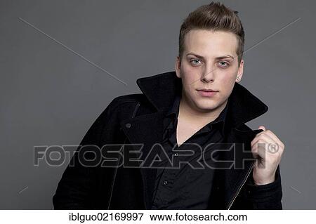 Young man in a black jacket, portrait View Large Photo Image Stock Photo - Young man in a black jacket, portrait. Fotosearch