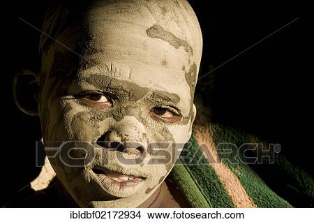 Picture - Young person with a painted face, traditional circumcision ceremony, Transkei, Eastern Cape, South Africa, Africa. Fotosearch