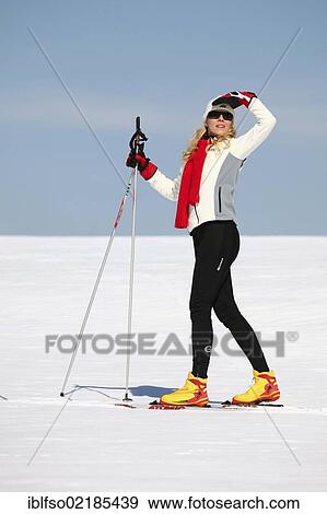 Stock Photo - Young woman, about 25 years, cross-country skiing, near Masserberg, Thuringian Forest mountains, Thuringia, Germany, Europe. Fotosearch