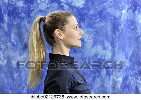 Young woman, in profile View Large Photo Image Stock Photography - Young woman, in profile. Fotosearch