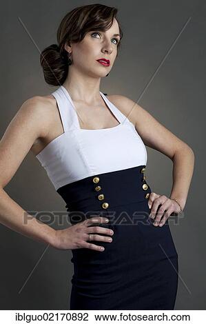 Stock Image - Young woman, pin-up look. Fotosearch