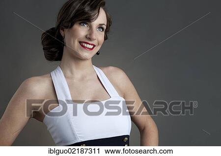 Young woman, smiling, pin-up style, portrait View Large Photo Image Stock Image - Young woman, smiling, pin-up style, portrait. Fotosearch