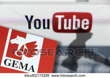 Stock Photograph - YouTube video portal logo and GEMA copyright association logo, at back, shadow of a judge's hammer, symbolic image. Fotosearch