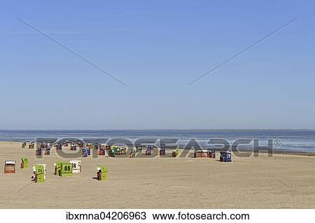 Stock Image - Beach chairs at the artificial beach in Neuharlingersiel, Neuharlingersiel, East Frisia, Lower Saxony, Germany, Europe. Fotosearch