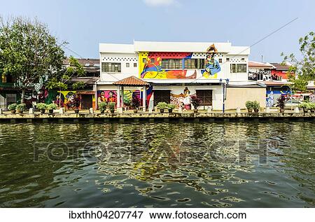 Brightly painted house fronts along the Malacca River, district of Kampung Bakar Batu, Malacca or Melaka, Malaysia, Asia View Large Photo Image Stock Photo - Brightly painted house fronts along the Malacca River, district of Kampung Bakar Batu, Malacca or Melaka, Malaysia, Asia. Fotosearch