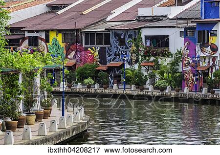 Brightly painted house fronts along the Malacca River, district of Kampung Bakar Batu, Malacca or Melaka, Malaysia, Asia View Large Photo Image Stock Photo - Brightly painted house fronts along the Malacca River, district of Kampung Bakar Batu, Malacca or Melaka, Malaysia, Asia. Fotosearch