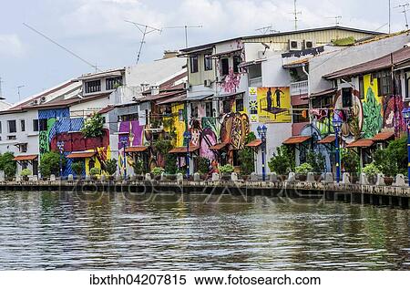 Brightly painted house fronts along the Malacca River, district of Kampung Bakar Batu, Malacca or Melaka, Malaysia, Asia View Large Photo Image Stock Photography - Brightly painted house fronts along the Malacca River, district of Kampung Bakar Batu, Malacca or Melaka, Malaysia, Asia. Fotosearch